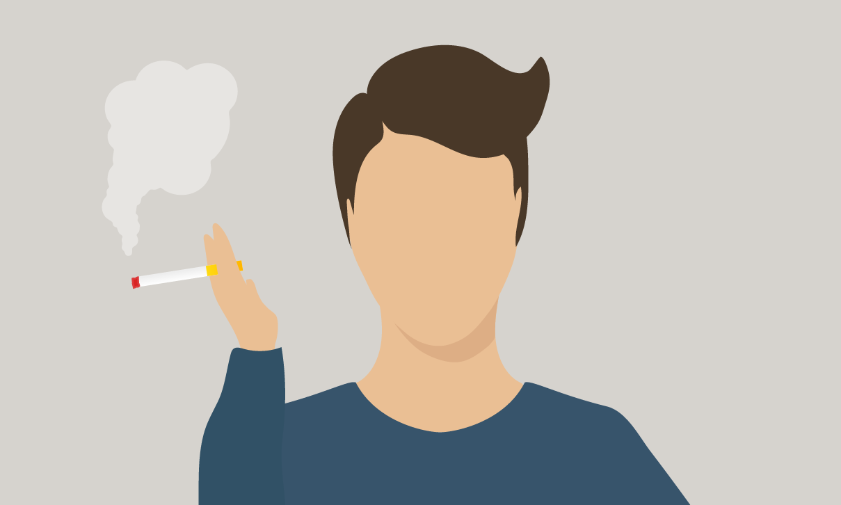 Person som ryger en cigaret